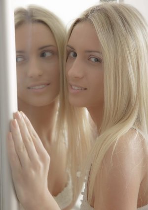 18 year old beauty uncovers her big tits before losing her virginity